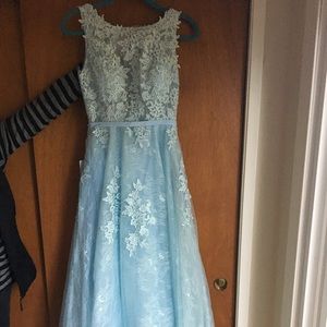 A light blue long prom dress. Never worn brand new